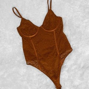 Rust orange thong bodysuit